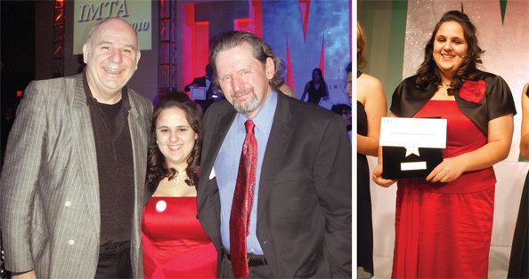 Modeling school and agency owner Charles Nemes with scholarship recipient Crystal Varelis