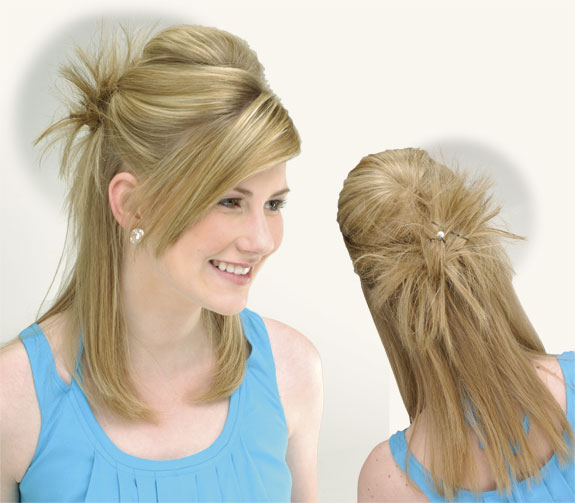 Simple Steps: Tease your hair in the top and make a knot in the back.