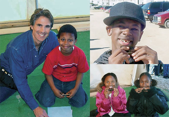 HITTING ALL THE RIGHT NOTES: These children, displaced by damage to their New Orleans homes from Hurricane Katrina, were the beneficiaries of free harmonicas and a blues music lesson, thanks to the extra effort of Harmonikids and Gary Allegretto.