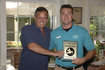 Carl Dunn presents the Spirit Award to Cody Yerian