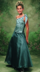 Model wearing a children's dress by Mon Cheri Bridals