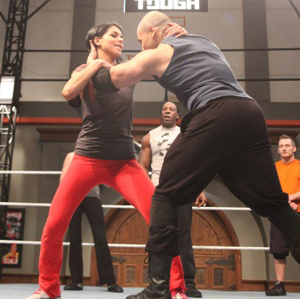 Rima enters the ring