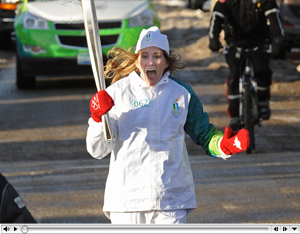 Kaitlyn Chana carries the Olympic flame