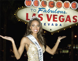 Miss USA 2008 poses in front of the Welcome to Las Veags sign.