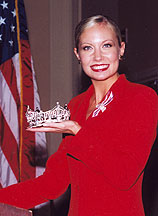Katie Harmon with crown and flag